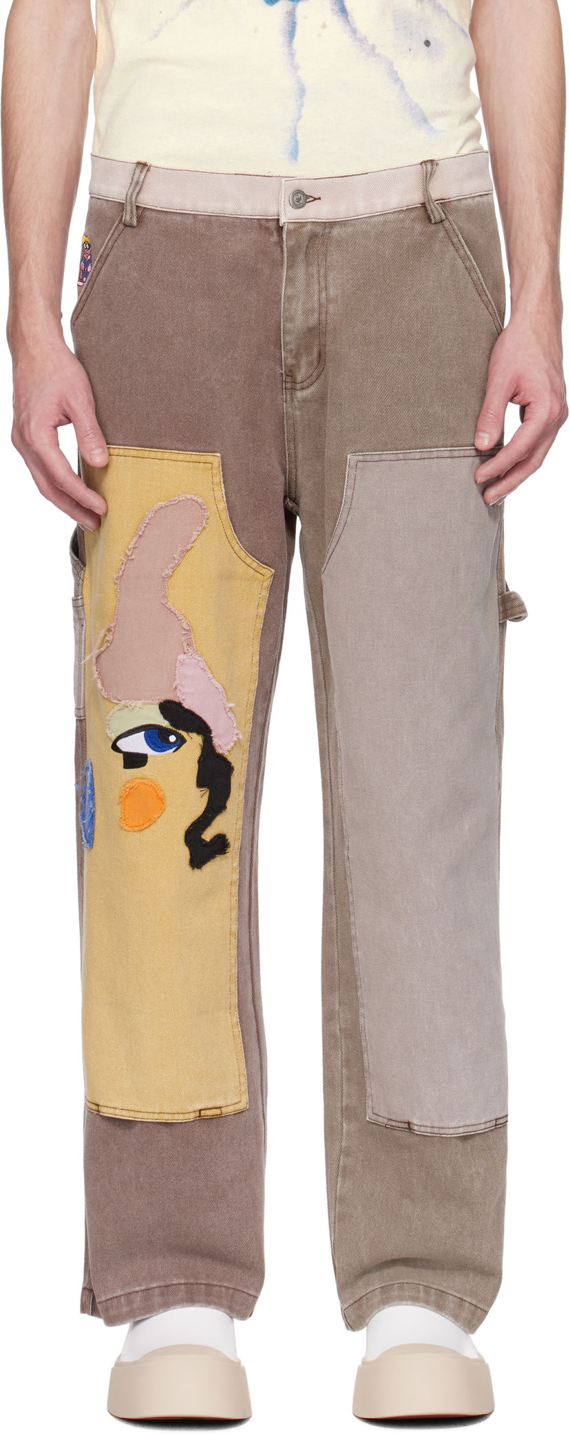 Штани карго KidSuper KidSuper Patchwork Face Double Knee Trousers Коричневий | SS25-PT-03