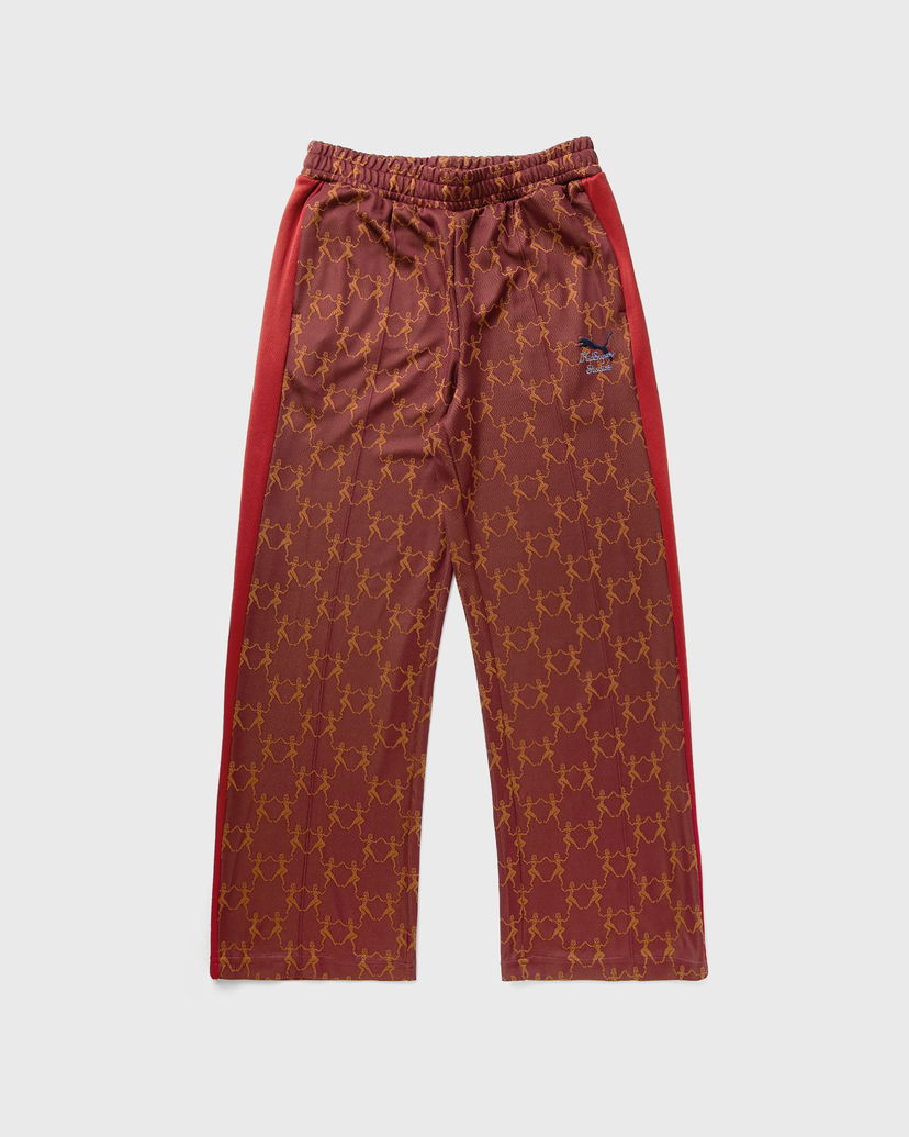 Штани Puma KIDSUPER All-Over Graphic Print Side Stripe Track Pants Різнокольоровий | 632375-96