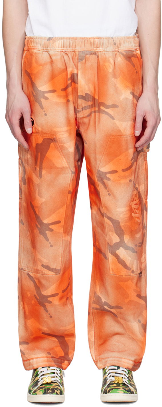 Штани карго AAPE by A Bathing Ape AAPE by A Bathing Ape Camo Cargo Pants Помаранчевий | AAPPTMA682XAMBGE