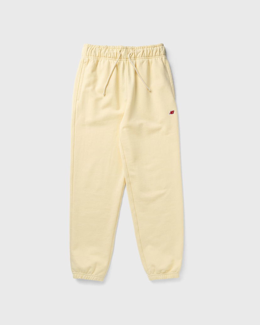 Спортивні штани New Balance Core Sweatpants Жовтий | MP43547-CAU
