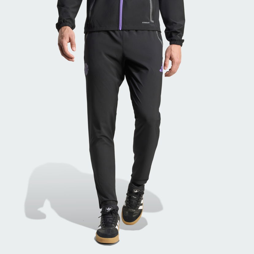 Штани adidas Performance Manchester United Tiro 25 Competition Vis Tech Travel Pants чорний | JV5352